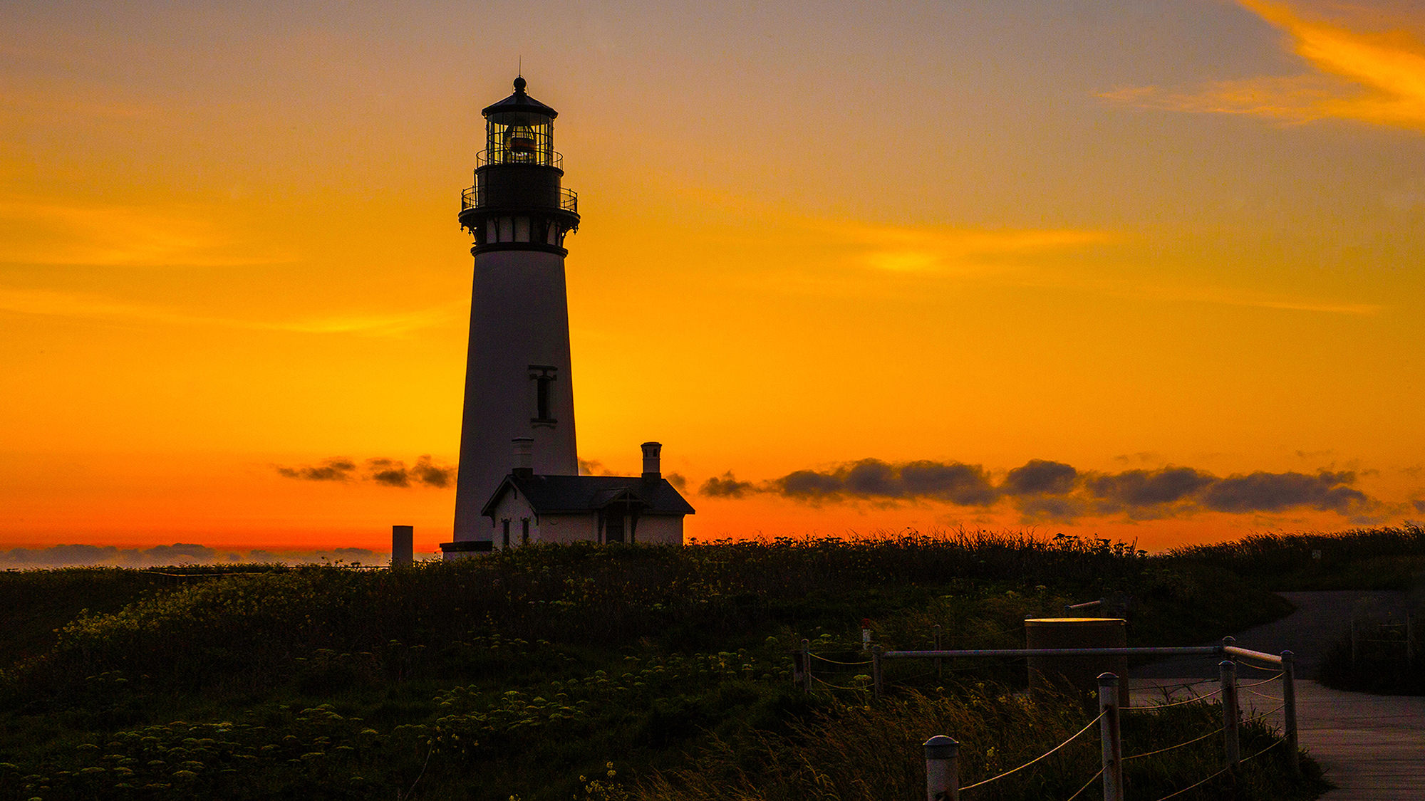 Yaquina Head Lighthouse in Newport Oregon by Skip Weeks