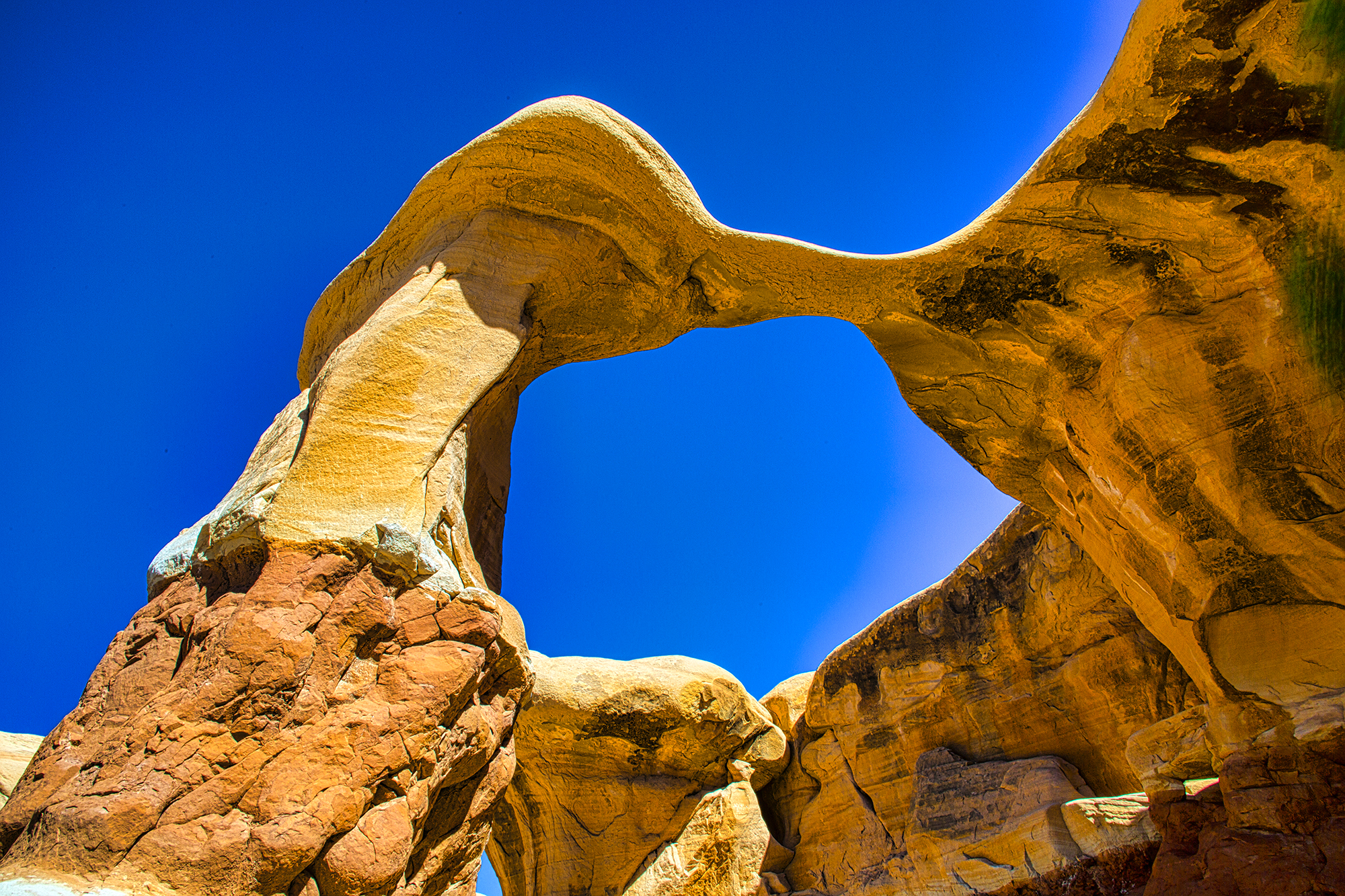Metate Arch at Escalante National Park by Skip Weeks
