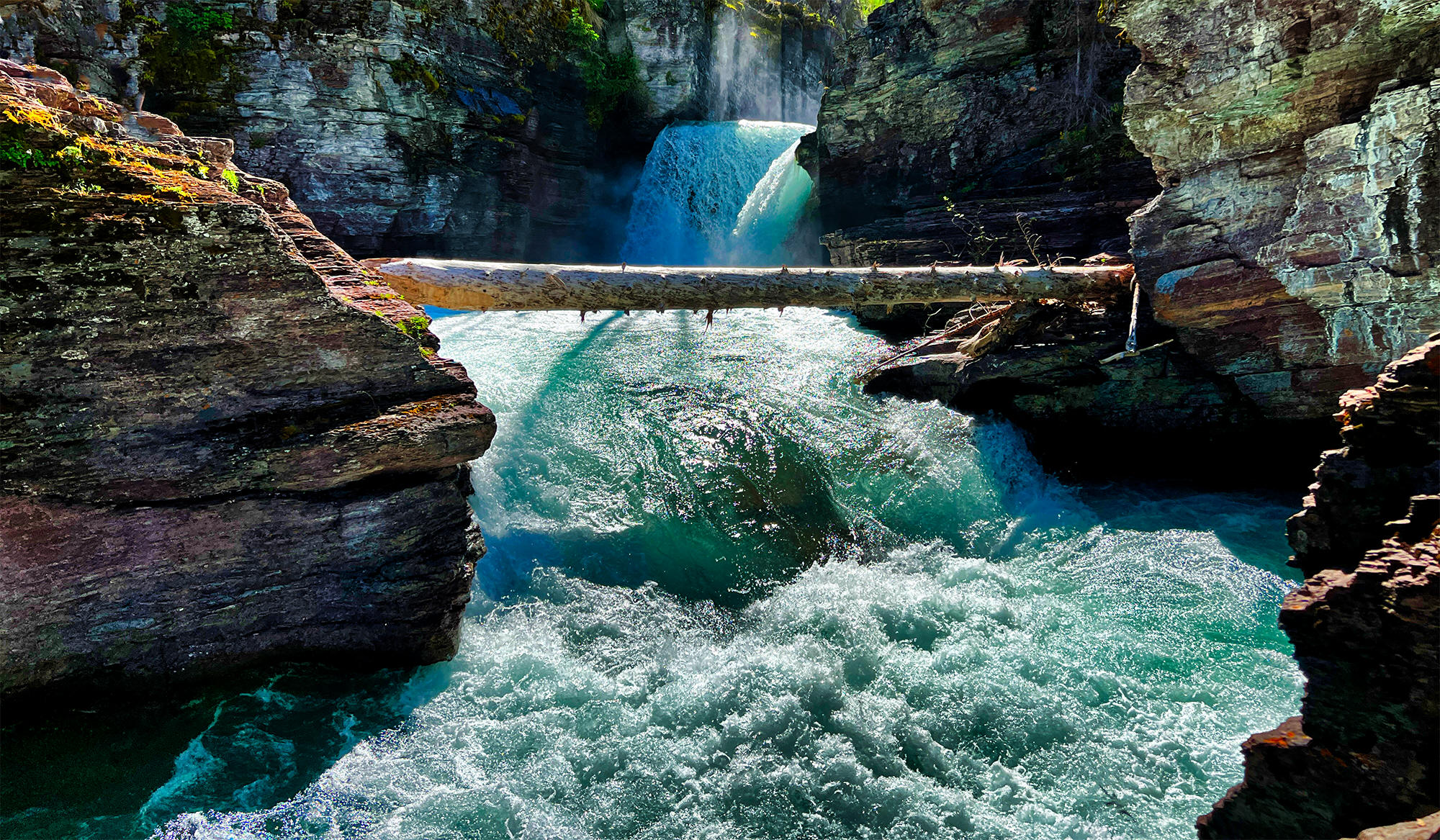 SAINT MARY'S FALLS IN GLACIER NATIONAL PARK